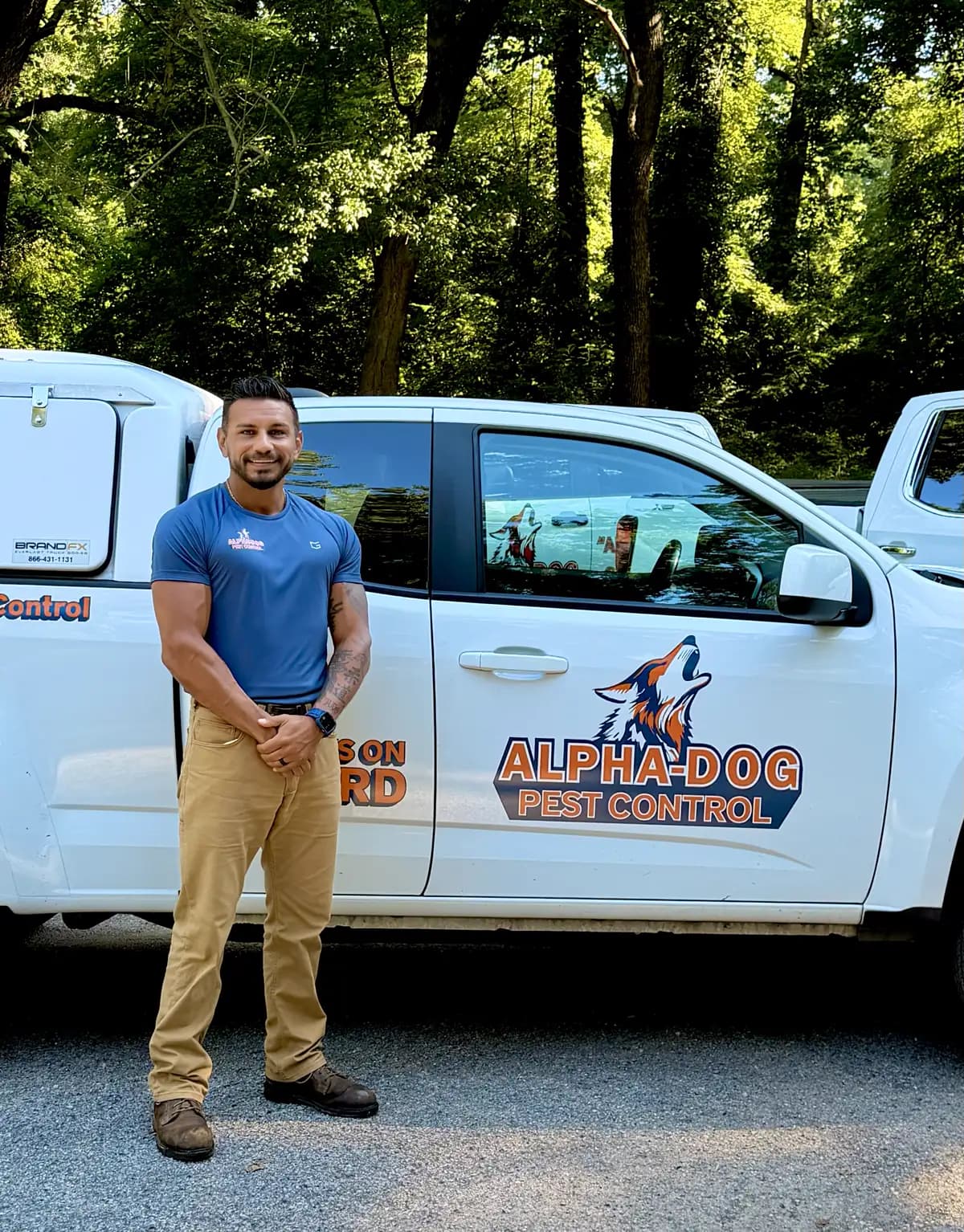 Owner Zach Krietemeyer in an Alpha-Dog shirt outside the shop.